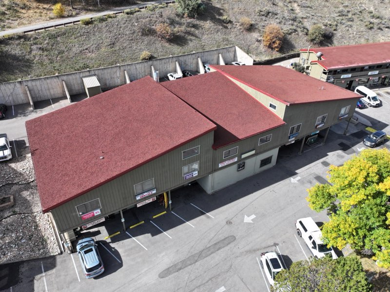 Aerial view of a red shingle commercial roof