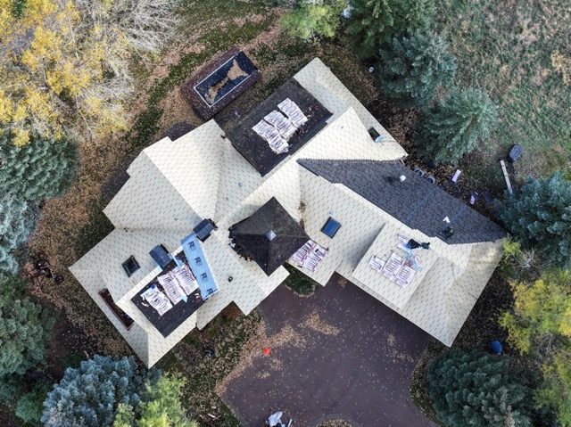 Aerial view of a home mid re-roof